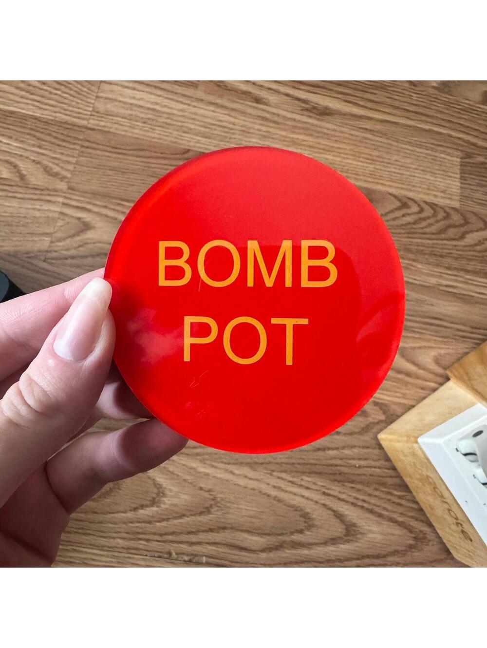 Bomb Pot poker button, a casino accessory used in poker games